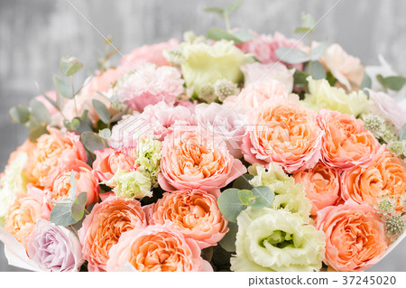 beautiful bouquet of mixed flowers in a vase on 37245020