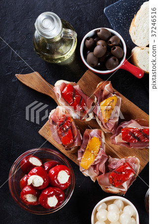 Spanish tapas with slices jamon serrano 37246516
