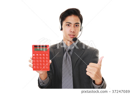 A smiling operator with a calculator A smiling operator with a calculator 37247089