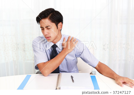 A businessman with a tired expression 37247127