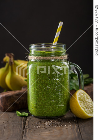 Healthy green smoothie with spinach in glass jar 37247429
