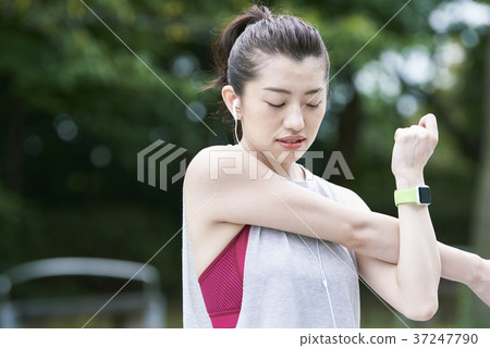 Young woman park stretching Young woman park stretching 37247790