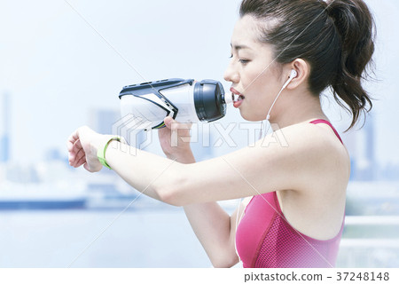 Young woman taking a break in training 37248148
