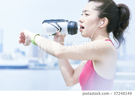 Young woman taking a break in training Young woman taking a break in training 37248149