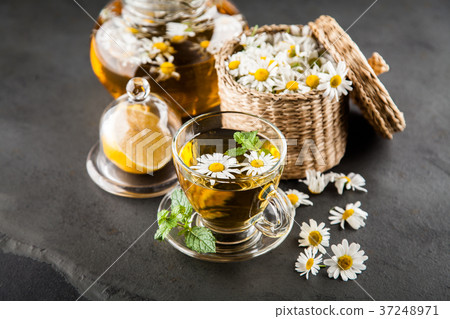 Cup of chamomile tea 37248971