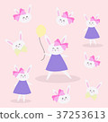 Cute little girl bunny holding yellow balloon. 37253613