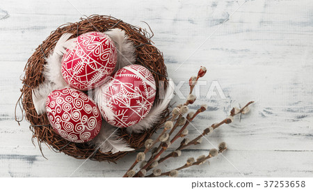 Pysanky, decorated Easter eggs in the nest Pysanky, decorated Easter eggs in the nest 37253658