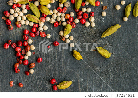 Closeup colorful spices mixture on dark background 37254631