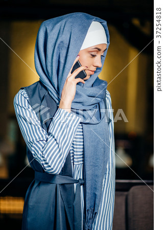 Successful Arab woman. Arab businesswoman wearing Successful Arab woman. Arab businesswoman wearing 37254818