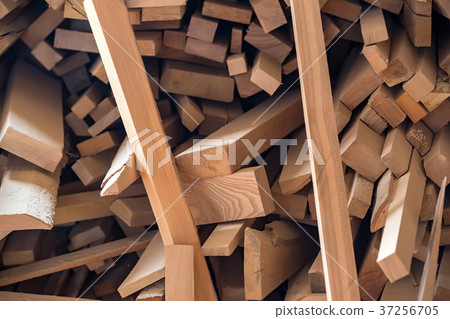 Many wooden beams stored at carpenter's 37256705