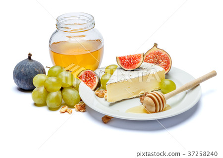 traditional french brie cheese and honey on a 37258240