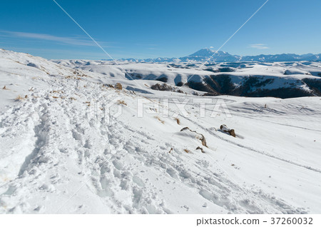The landscape of snow-covered Caucasian rocks on 37260032