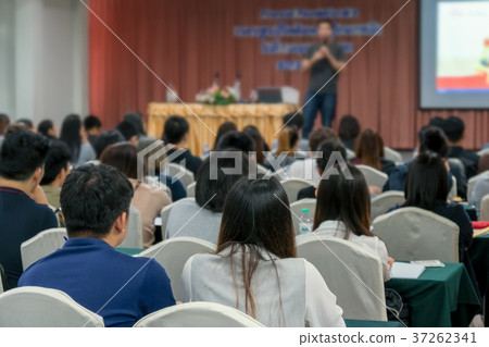 Speakers on the stage with Rear view of Audience in the conference hall or seminar meeting, business and education concept 37262341