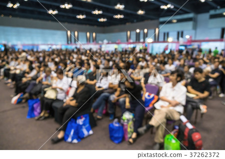 Abstract blurred photo of conference hall or seminar room with attende background, business and education concept Abstract blurred photo of conference hall or seminar room with attende background, business and education concept 37262372