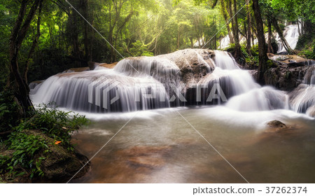 Beautiful waterfall in the deep forest,Pha Tat Waterfall, Kanchanaburi province, thailand, Nature travel concept Beautiful waterfall in the deep forest,Pha Tat Waterfall, Kanchanaburi province, thailand, Nature travel concept 37262374