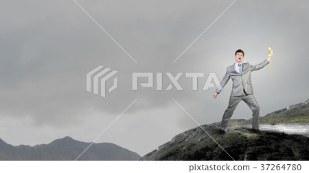 Man with phone receiver 37264780