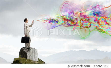 Woman spraying colors Woman spraying colors 37265939