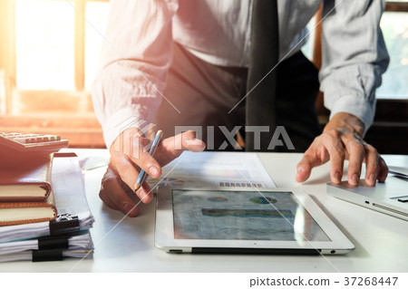 Businessman working with smart phone Businessman working with smart phone 37268447
