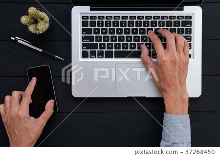 Businessman working with modern laptop Businessman working with modern laptop 37268450