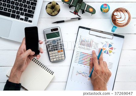 Businessman discussing the analysis charts Businessman discussing the analysis charts 37269047