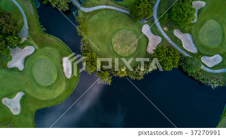 Aerial view of green golf course. 37270991