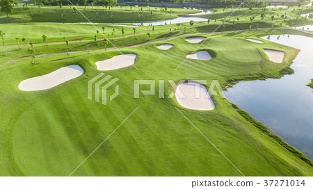 Aerial view of green golf course. Aerial view of green golf course. 37271014