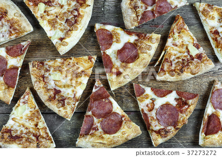 Pizza-background. Pepperoni pizza and Hawaiian 37273272