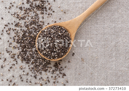 Chia seeds in wooden spoon top view 37273410