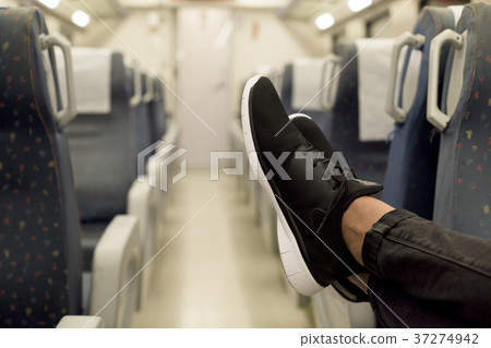 young man in a train or subway 37274942