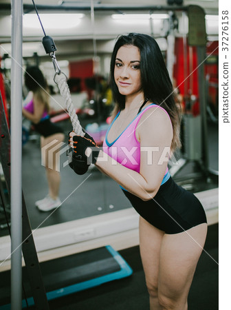 girl shakes her triceps on the machine girl shakes her triceps on the machine 37276158