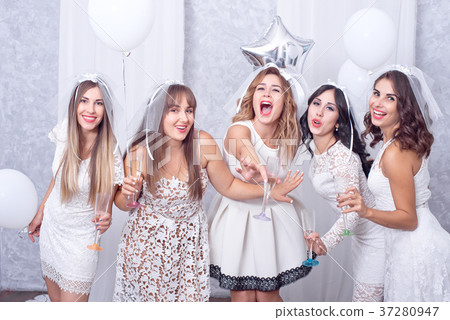 Girls having fun, drinking champagne, henparty 37280947