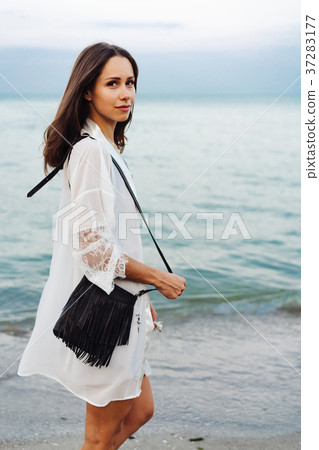 beautiful young girl with a handbag beautiful young girl with a handbag 37283177