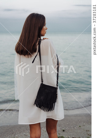 beautiful young girl with a handbag beautiful young girl with a handbag 37283181
