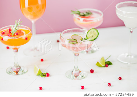 The rose exotic cocktails and fruits on pink The rose exotic cocktails and fruits on pink 37284489