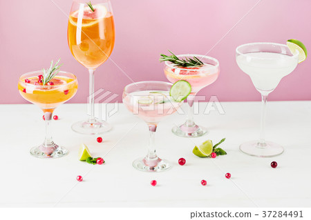 The rose exotic cocktails and fruits on pink The rose exotic cocktails and fruits on pink 37284491