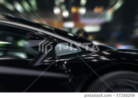 Zoom sports car mirror and door in Car show event 37288209