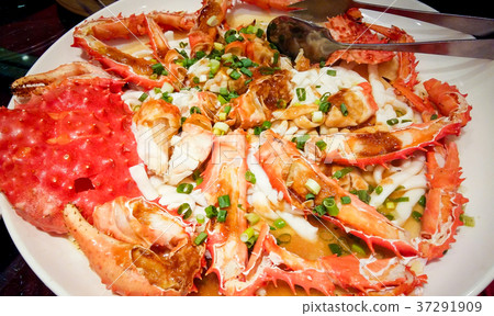 king crab legs meat on white plate king crab legs meat on white plate 37291909