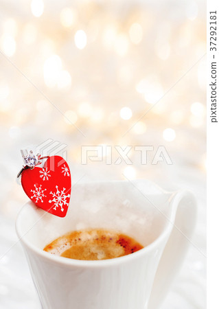 cup of coffee with heart and engagement ring cup of coffee with heart and engagement ring 37292181