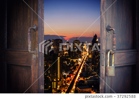 old wood window open to cityscape view 37292588