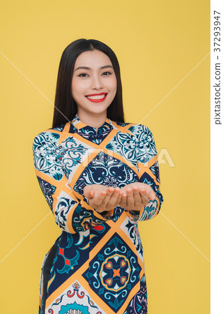 Attractive Vietnamese woman wearing AoDai 37293947