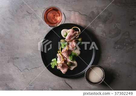 Veal with tuna sauce vitello tonnato Veal with tuna sauce vitello tonnato 37302249