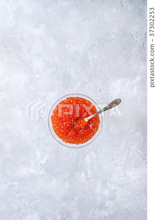 Glass of red caviar 37302253