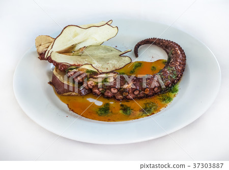 A plate of grilled octopus 37303887