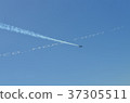 Airplane jet blue sky contrail crossing letters air show 37305511