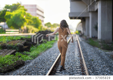 Woman Out Door Portrait Posing Against Sunshine. Woman Out Door Portrait Posing Against Sunshine. 37305819