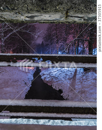snow-covered railing and river snow-covered railing and river 37305915