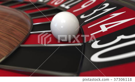 Casino roulette wheel ball hits 14 fourteen red 37306118
