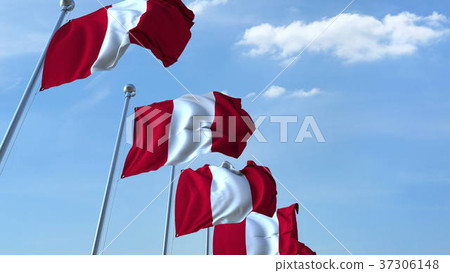 Multiple waving flags of Peru against the blue sky Multiple waving flags of Peru against the blue sky 37306148