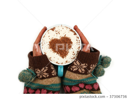 Woman hands hold full latte cappuccino coffee cup Woman hands hold full latte cappuccino coffee cup 37306736