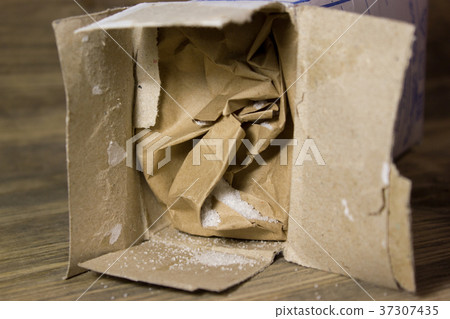 Small table Salt in Kraft box spilled on wooden Small table Salt in Kraft box spilled on wooden 37307435